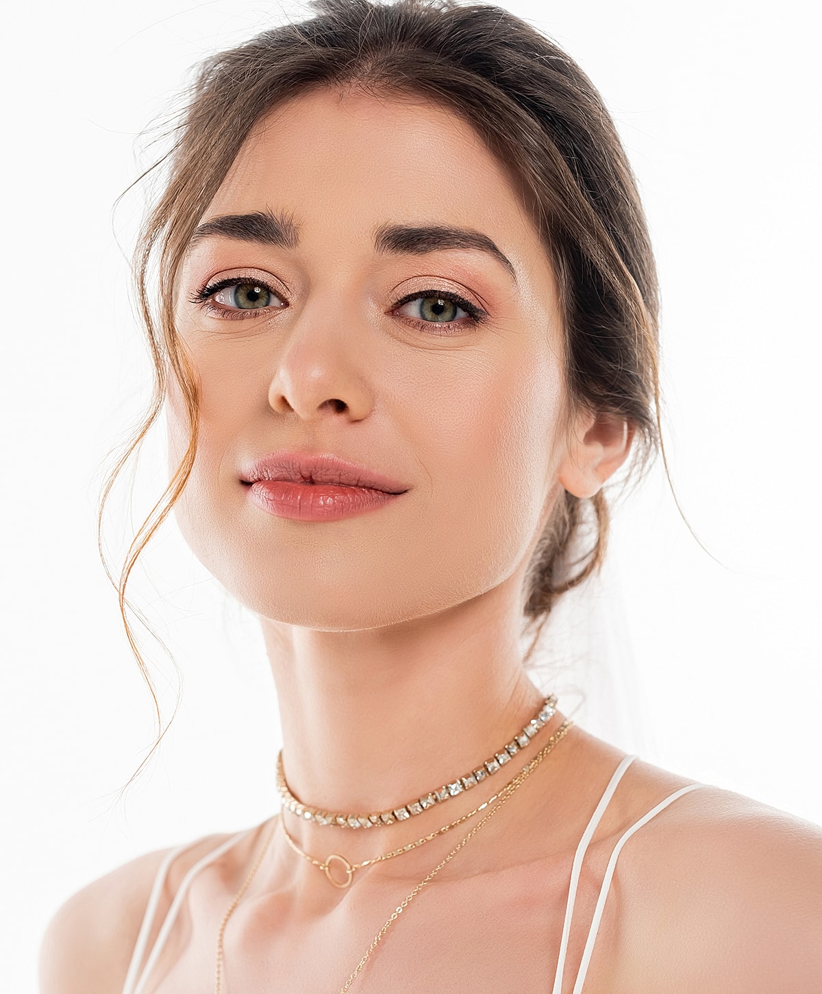 Close-up of a woman with elegant jewelry.